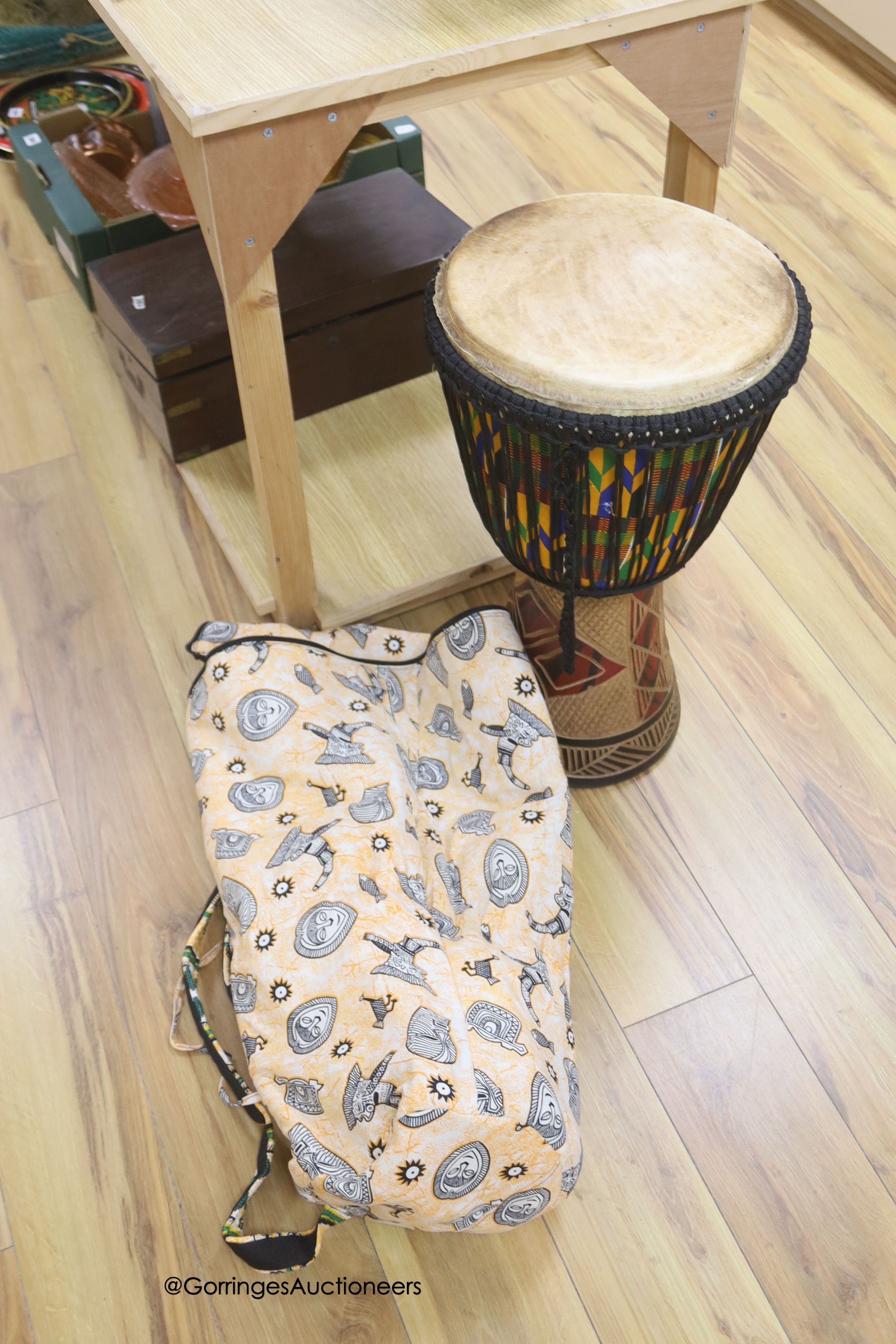 A Ghanian Djembe drum, height 62cm